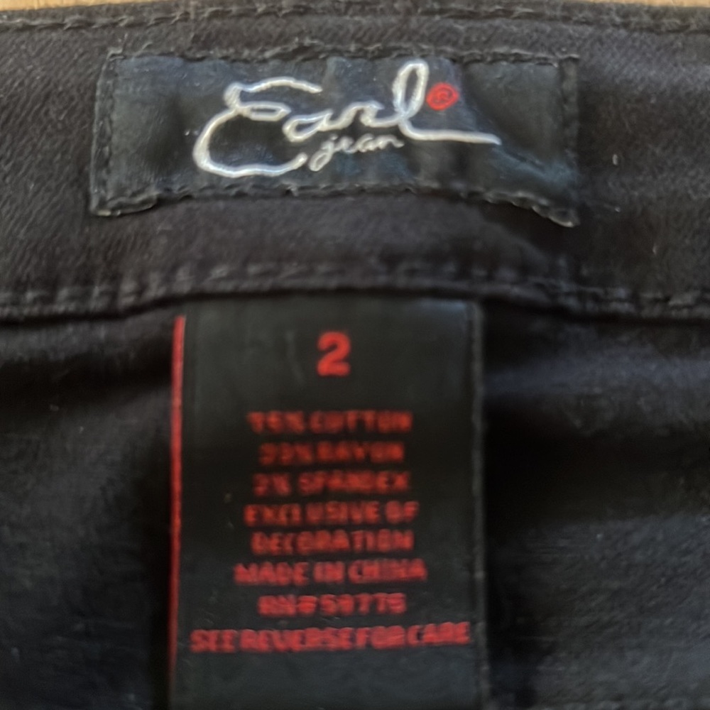 Earl Jeans with fringe and embroidered floral design on back leg. - Picture 9 of 10